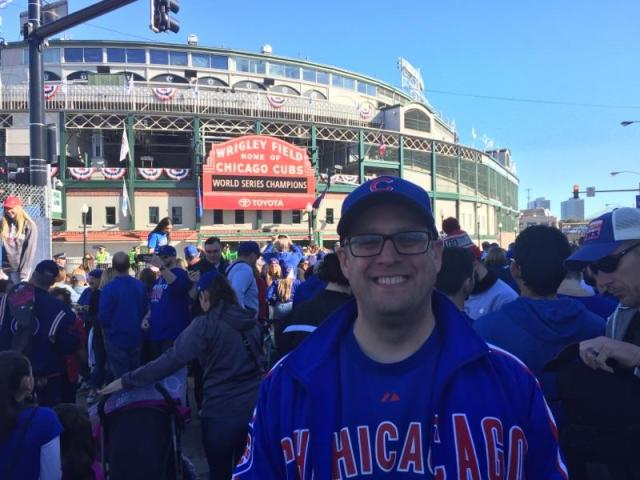 My childhood friend John. One of the biggest Cub fans I know.